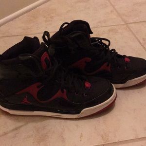 black and red Jordan’s
